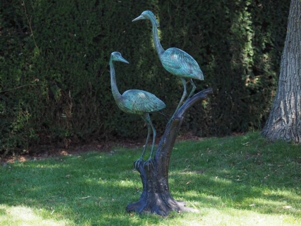 bronzen reigers op tak - eliassen.nl